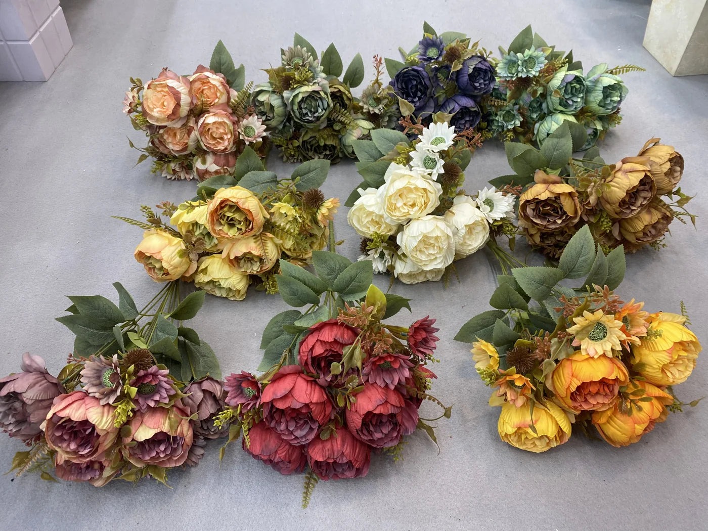 Real artificial peony family photograph showing multiple product references