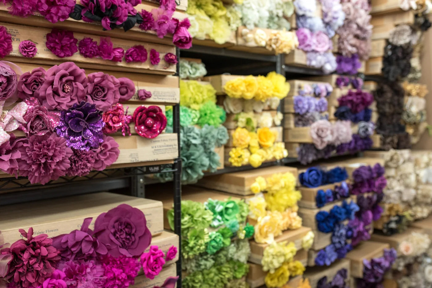 Industry sample reference: artificial flower forms and colours arranged in maker trays